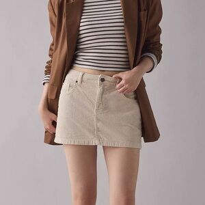 URBAN OUTFITTERS BDG in Ivory 
Corduroy Mini Skirt. Size Small. Brand w/ Tags.